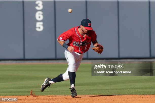 Mississippi Rebels infielder Jacob Adams attempts to catch a ground ball during a game between the Mississippi Rebels and the Tennessee Tech Golden...