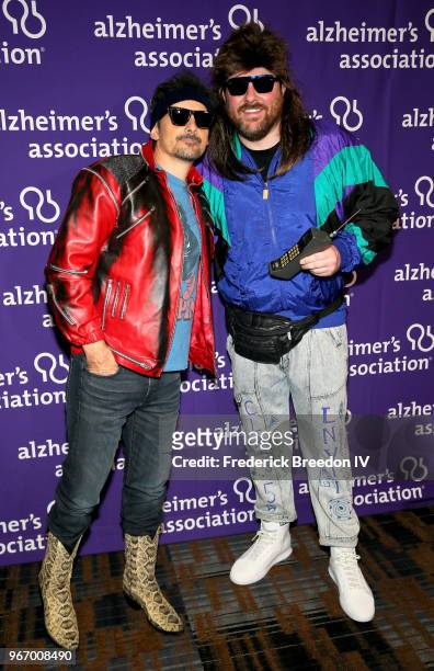 Singer-songwriters Brad Paisley and Chris Young attend Nashville '80s Dance Party benefiting The Alzheimer's Association at Wildhorse Saloon on June...