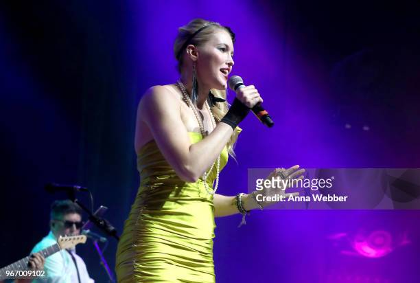 Singer-songwriter Ashley Campbell performs onstage during Nashville '80s Dance Party benefiting The Alzheimer's Association at Wildhorse Saloon on...