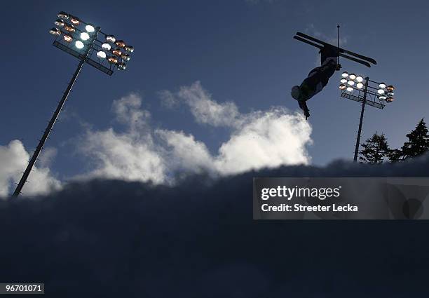 Patrick Deneen of the United States performs an aerial during the Freestyle Skiing Men's Moguls qualification run on day 3 of the 2010 Winter...