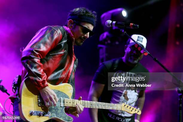 Singer-songwriters Brad Paisley and Darius Rucker perform onstage during Nashville '80s Dance Party benefiting The Alzheimer's Association at Wild...