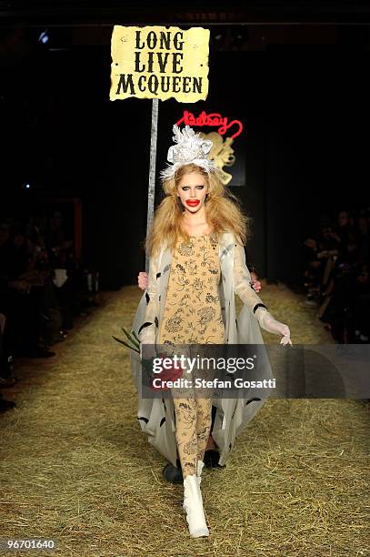 Model walks the runway at the Betsey Johnson Fall 2010 Fashion Show during Mercedes-Benz Fashion Week at the Altman Building on February 14, 2010 in...