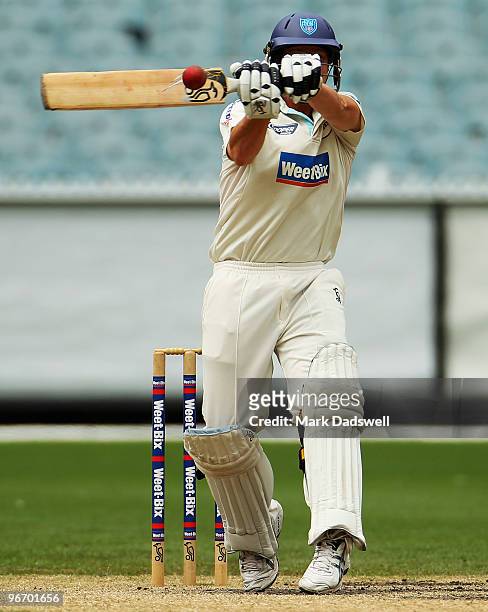Steven Smith of the Blues hooks a short delivery for four during day four of the Sheffield Shield match between the Victorian Bushrangers and the...