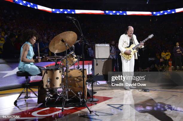 Entertainer Carlos Santana performs National Anthem before the game between the Cleveland Cavaliers and the Golden State Warriors in Game Two of the...