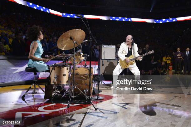 Entertainer Carlos Santana performs National Anthem before the game between the Cleveland Cavaliers and the Golden State Warriors in Game Two of the...