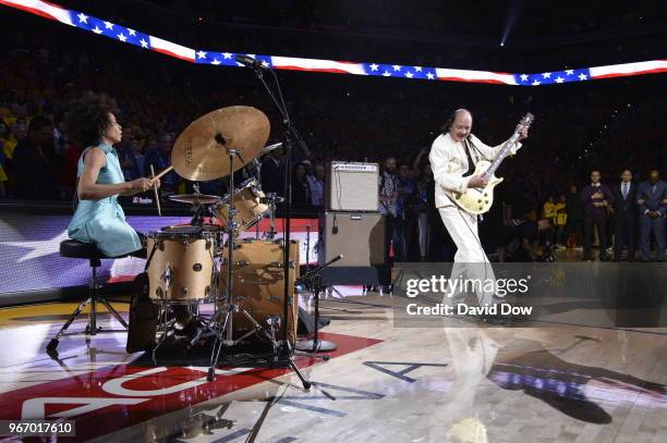Entertainer Carlos Santana performs National Anthem before the game between the Cleveland Cavaliers and the Golden State Warriors in Game Two of the...