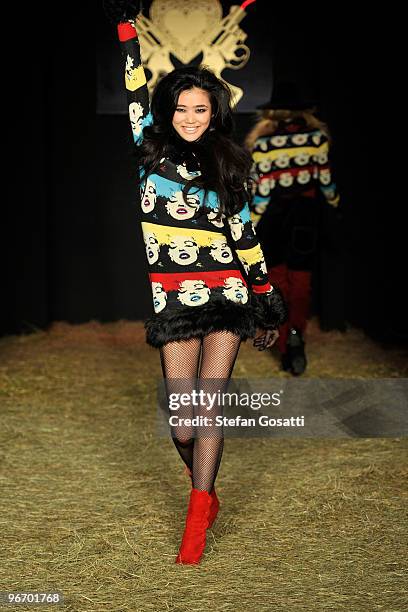 Model walks the runway at the Betsey Johnson Fall 2010 Fashion Show during Mercedes-Benz Fashion Week at the Altman Building on February 14, 2010 in...