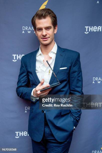 Andrew Garfield recives the award for outstanding actor in a play with Angels in America during the 2018 Drama Desk Awards arrivals at the Marriott...