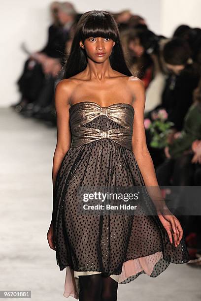 Model walks the runway at the Erin Fetherston Fall/Winter 2010 fashion show at Milk Studios on February 14, 2010 in New York City.