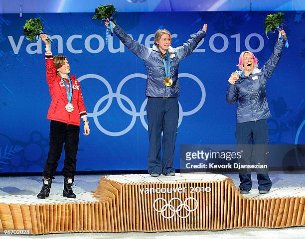 Jennifer Heil of Canada celebrates silver, Hannah Kearney of United States celebrates gold and Shannon Bahrke of United States celebrates bronze...