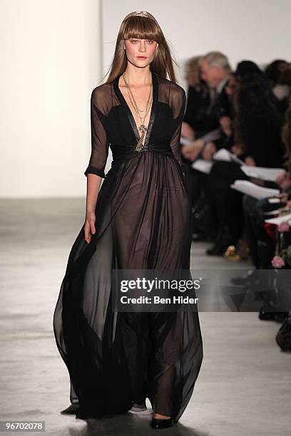 Model walks the runway at the Erin Fetherston Fall/Winter 2010 fashion show at Milk Studios on February 14, 2010 in New York City.