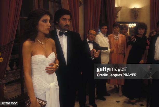 Nicolas Silberg et Caroline Aguilar lors du tournage du film 'Mesrine' realise par Andre Genoves le 26 janvier 1984 a Paris, France.