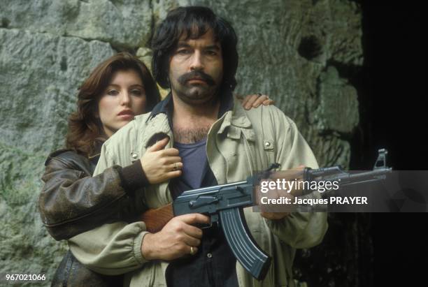 Nicolas Silberg et Caroline Aguilar lors du tournage du film 'Mesrine' realise par Andre Genoves le 26 janvier 1984 a Paris, France.