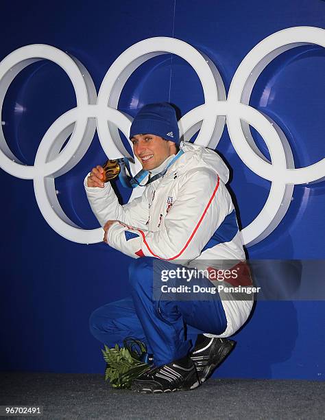 Jason Lamy Chappuis of France celebrates with his gold medal during the Medal ceremony for the Nordic Combined Men's Individual 10km on day 3 of the...