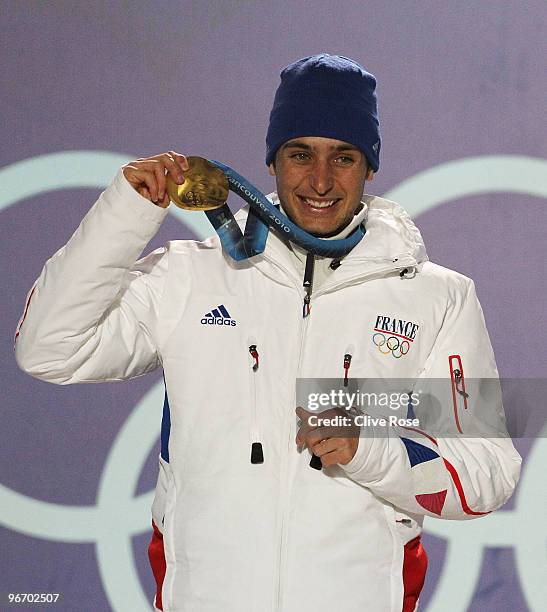 Jason Lamy Chappuis of France celebrates with his gold medal during the Medal ceremony for the Nordic Combined Men's Individual 10km on day 3 of the...