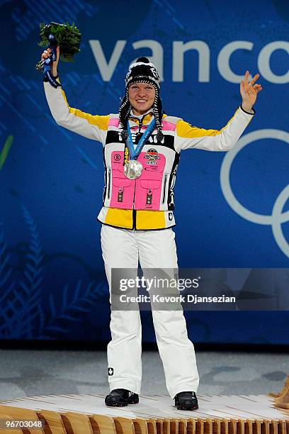 Stephanie Beckert of Germany celebrates with her silver medal during the Medal Ceremony for the Speed Skating Ladies' 3,000m on day 3 of the...