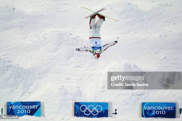 Alexandre Bilodeau of Canada competes on his way to winning the gold medal during the Freestyle Skiing Men's Moguls on day 3 of the 2010 Winter...