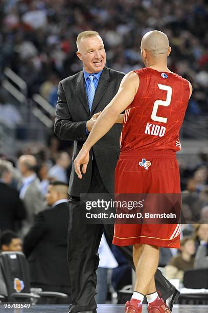 Legend Chris Mullin shakes hands with Jason Kidd of the Western Conference during the NBA All-Star Game, part of 2010 NBA All-Star Weekend on...