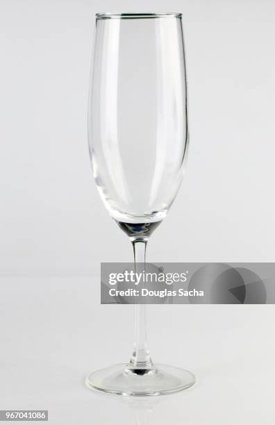 champagne flute crystal glass on a white background - champagne flute empty stock-fotos und bilder