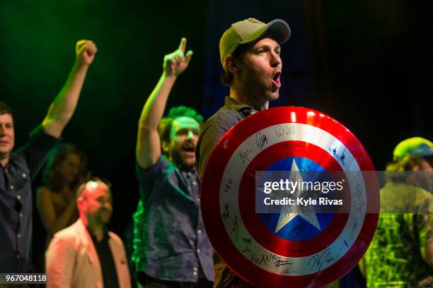 Paul Rudd auctions off a Captain America shield signed by all of the Avengers cast in the Celebrity Auction at Midland Theater during the Big Slick...