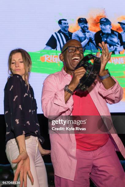 Sarah Chalke and Al Roker celebrate the announcement of the total donated amount in the Celebrity Auction at Midland Theater during the Big Slick...