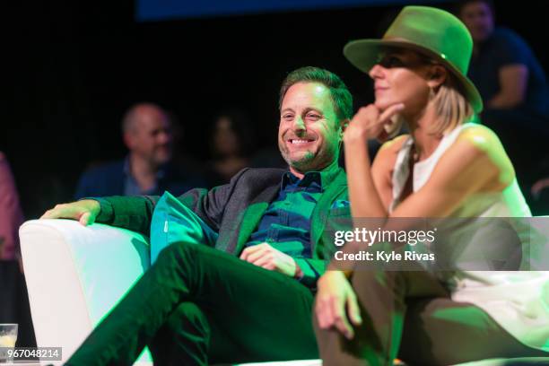 Chris Harrison and Eliza Coupe participate in the Celebrity Auction at Midland Theater during the Big Slick Celebrity Weekend benefitting Children's...