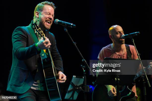 Chris Daughtry and David Cook sing a duet in the Celebrity Auction at Midland Theater during the Big Slick Celebrity Weekend benefitting Children's...