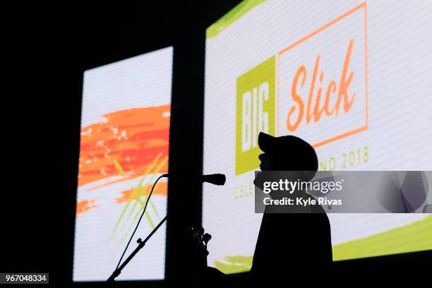 Member of the band Perpetual Change sings at the Celebrity Auction at Midland Theater during the Big Slick Celebrity Weekend benefitting Children's...