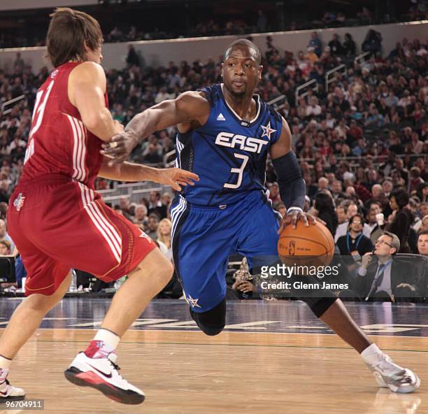 Dwyane Wade of the Eastern Conference drives against Steve Nash of the Western Conference during the NBA All-Star Game as part of the 2010 NBA...