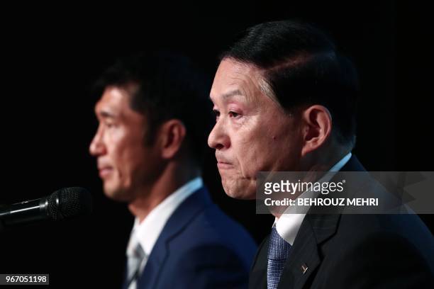 Toshiba Memory Corp. President Yasuo Naruke and head of Bain Capital's operations in Japan, Yuji Sugimoto , attend a joint press conference in Tokyo...