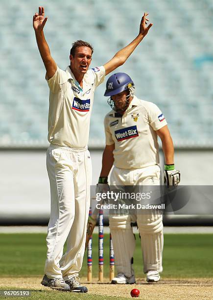 Trent Copeland of the Blues appeals for an lbw decision against Aaron Finch of the Bushrangers during day four of the Sheffield Shield match between...