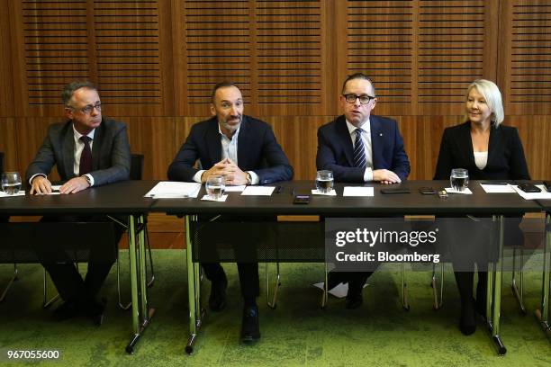 Andrew David, chief executive officer of the domestic unit of Qantas Airways Ltd., from left, Gareth Evans, chief executive officer of Jetstar Group,...