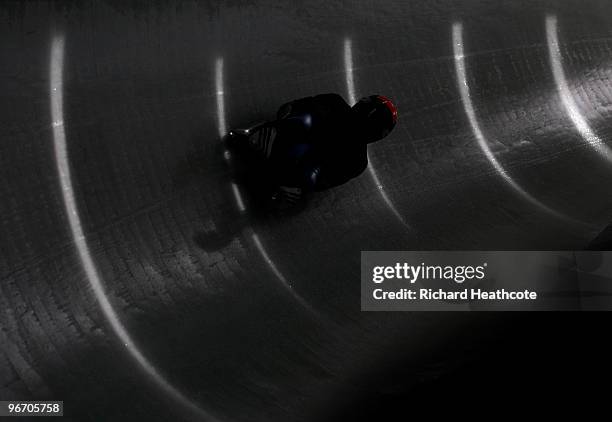 Luge rider comes down the track during the women's luge singles training run on day 3 of the 2010 Winter Olympics at Whistler Sliding Centre on...