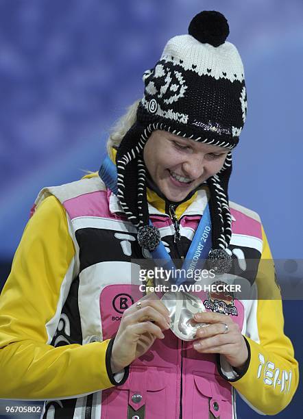 Stephanie Beckert of Germany holds the silver medal during the Medal Ceremony for the Speed Skating Ladies' 3,000m on day 3 of the Vancouver 2010...