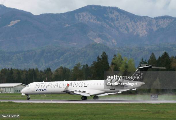 adria airways bombardier crj-900lr s5-aav - adria tour stock pictures, royalty-free photos & images