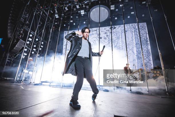 Austrian singer Maurice Ernst of Bilderbuch performs live on stage during Rock am Ring at Nuerburgring on JUNE 3, 2018 in Nuerburg, Germany.