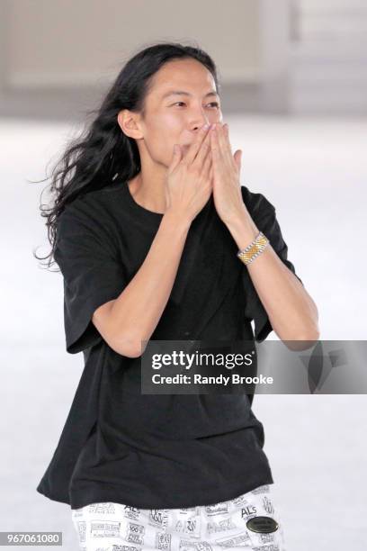 Designer Alexander Wang is about to blow a kiss after his Alexander Wang Resort Runway show June 2018 New York Fashion Week on June 3, 2018 in New...