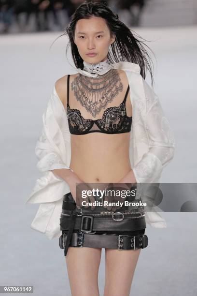 Model walks the runway during the Alexander Wang Resort Runway show June 2018 New York Fashion Week on June 3, 2018 in New York City.