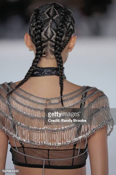 Back detail with hair geometric design, pigtails and safty pin top during the Alexander Wang Resort Runway show June 2018 New York Fashion Week on...