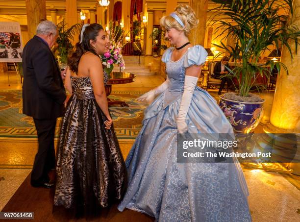 Genesis Soto, 20 greets "Cinderella" at the 13th annual National Capital Area Cinderella Ball, a prom for children with a disability or a...