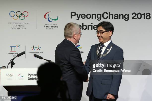 Sungil , the PyeongChang 2018 Vice President of Games Operations is awarded the Olympic Order by the IOC President Thomas Bach during the PyeongChang...