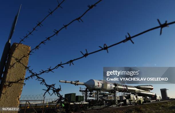 Soyuz MS-09 spacecraft is transported on the launch pad at the Russian-leased Baikonur cosmodrome in Kazakhstan on June 4, 2018. - The launch of the...