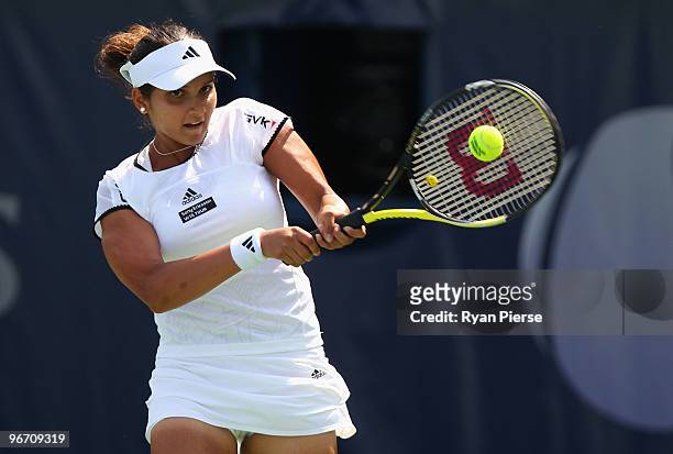 Sania Mirza of India hits a backhand during her first round match against Anabel Medina Garrigues of Spain during day two of the WTA Barclays Dubai...
