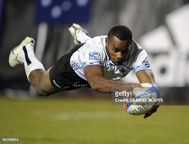 Fiji's Joeli Lutumailagi dives to score a try during the final for the Plate Final of the 2010 USA Sevens tournament at the Sam Boyd Stadium in Las...