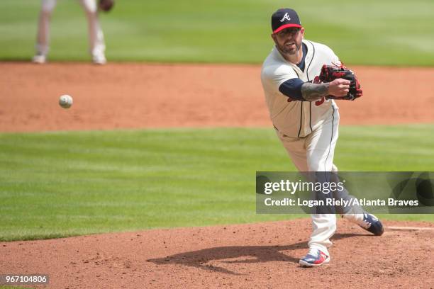 Peter Moylan of the Atlanta Braves pitches against the Miami Marlins at SunTrust Park on May 20 in Atlanta, Georgia. The Braves won on a walk off...