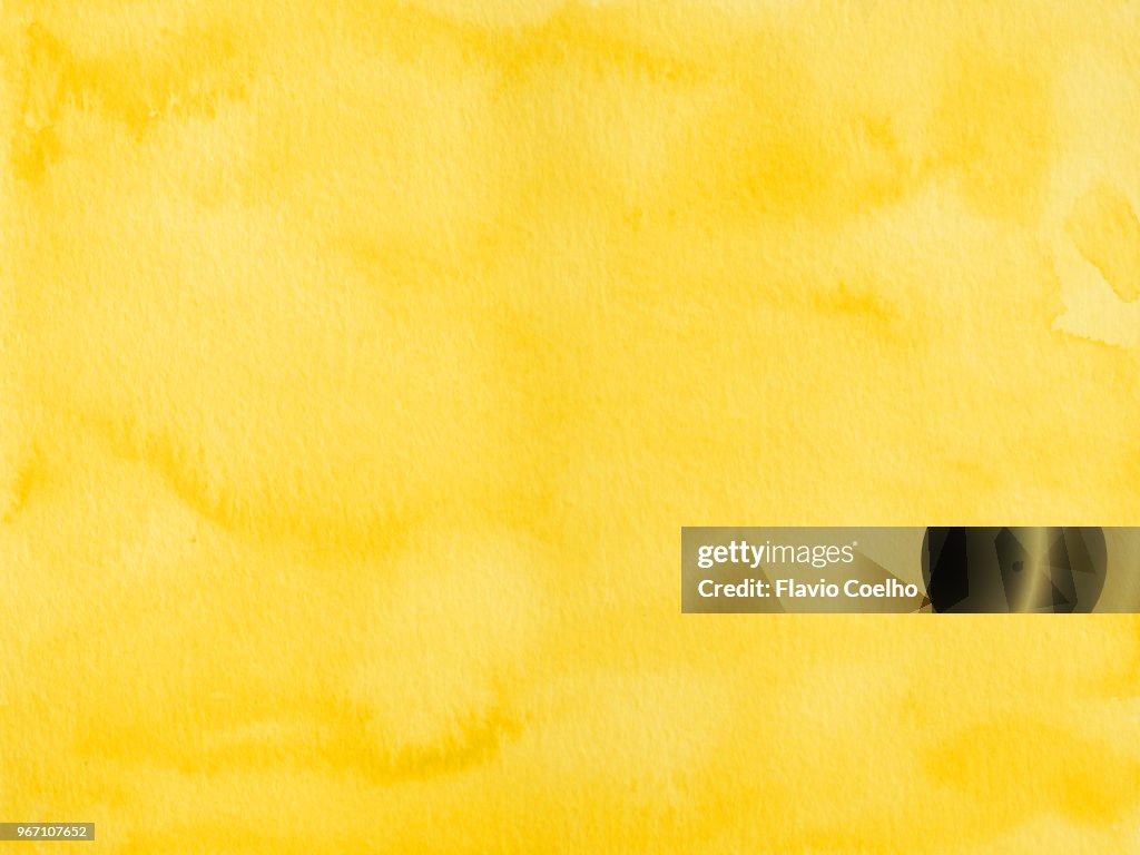 Yellow watercolor texture background