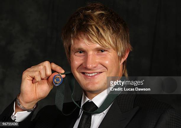 Shane Watson poses with the 2010 Allan Border Medal award during the 2010 Allan Border Medal at Crown Casino on February 15, 2010 in Melbourne,...