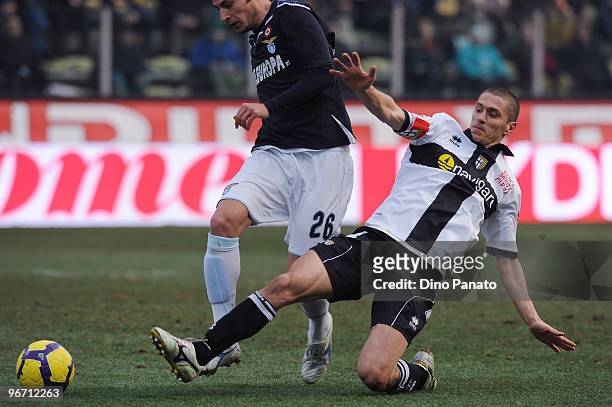 Stefan Radu of Lazio competes with Stefano Morrone of Parma during the Serie A match between Parma FC and SS Lazio at Stadio Ennio Tardini on...