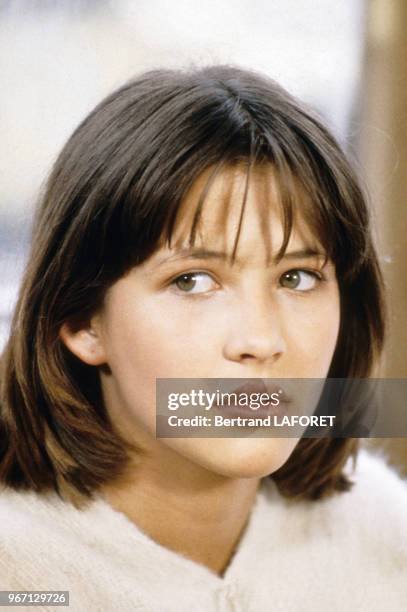 Sophie Marceau sur le tournage du film "La Boum 2" le 22 juillet 1982, France.