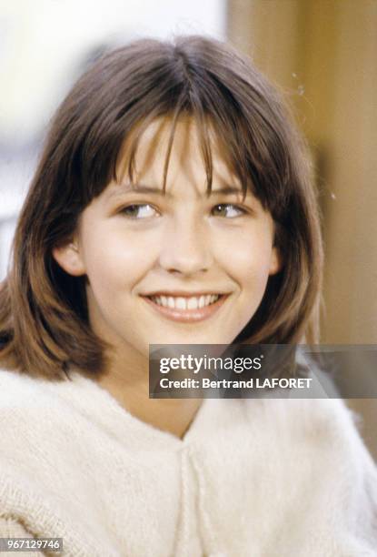 Sophie Marceau sur le tournage du film "La Boum 2" le 22 juillet 1982, France.
